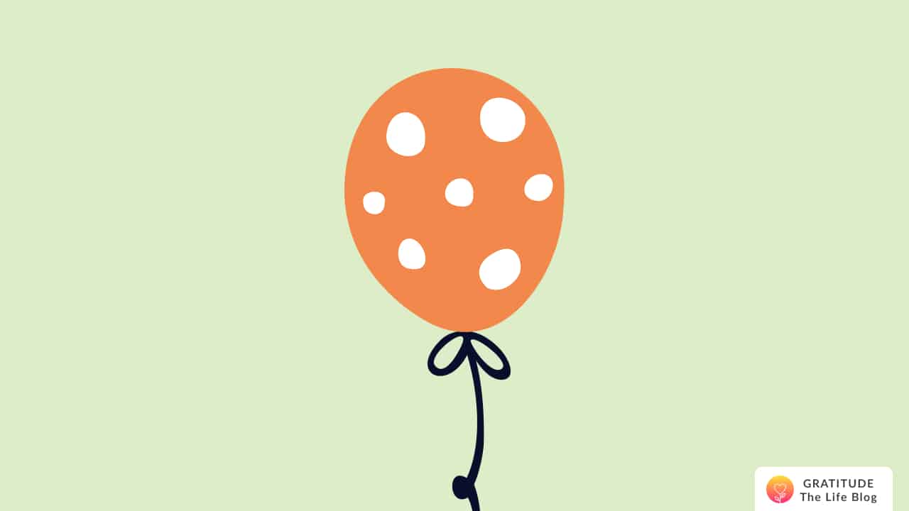 Illustration of an orange polka-dot balloon