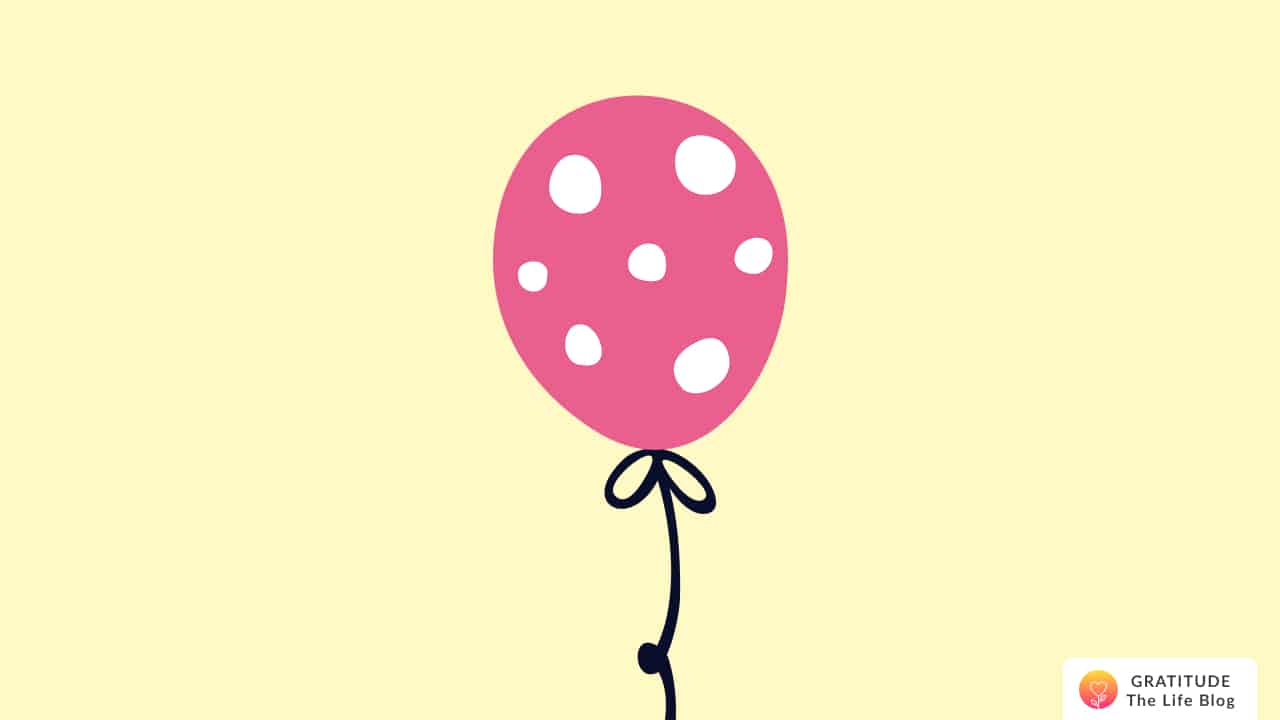 Illustration of a pink balloon with white dots
