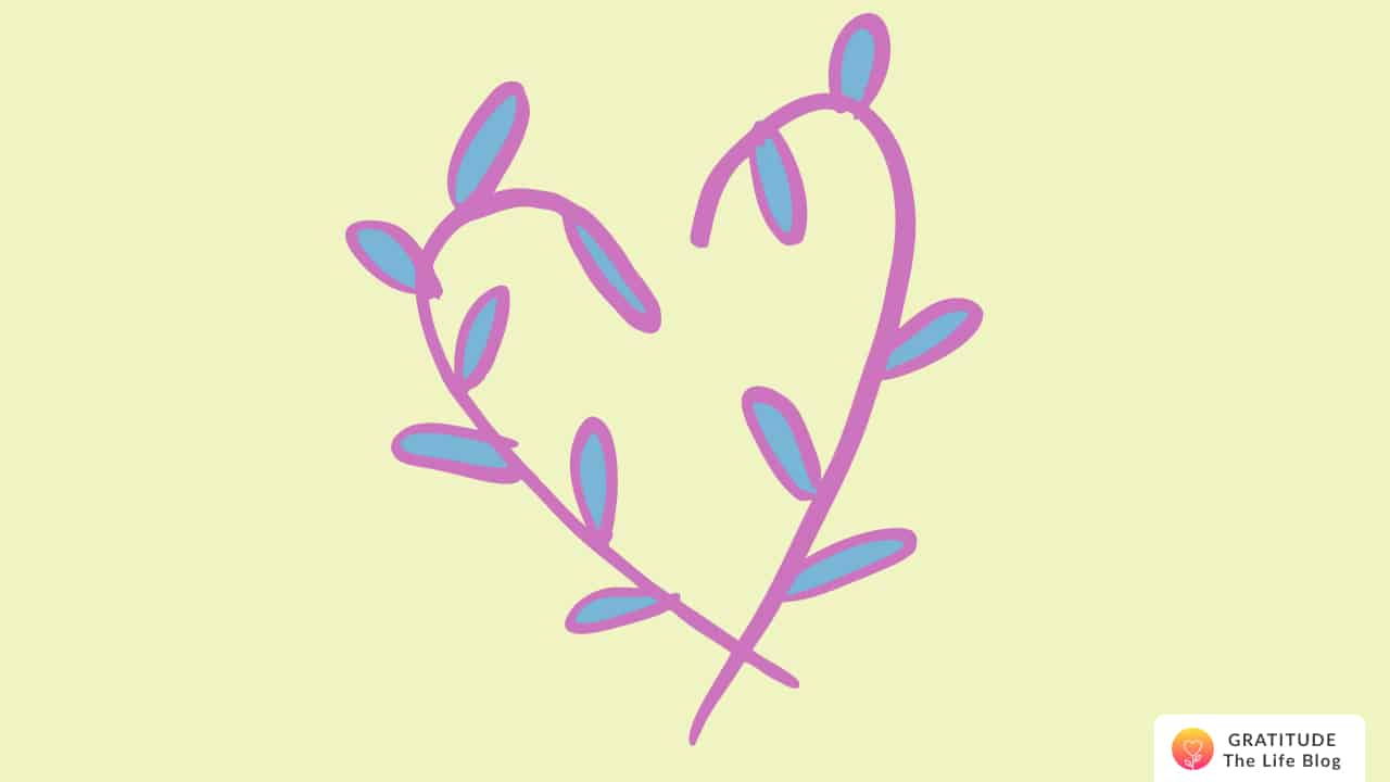 Illustration of a blue and pink leaf heart on a green background